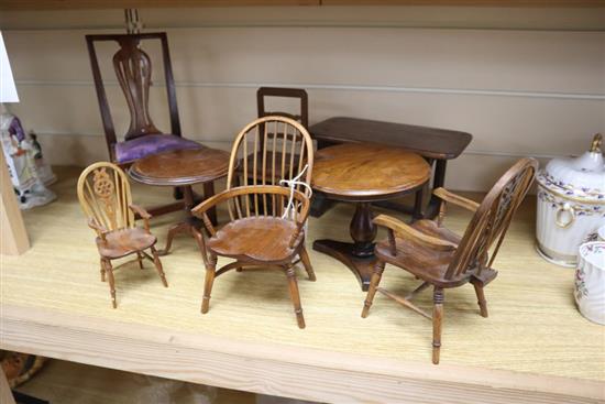 Eight pieces of miniature furniture including three tables, three chairs and chair-cum-step-ladder